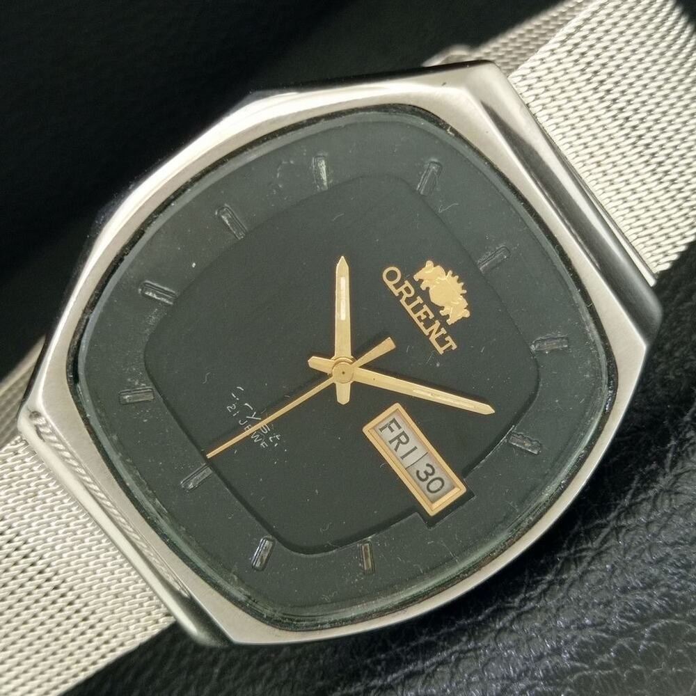 Vintage 1984 Orient Automatic Mens Silver Watch W/daydate & Gold accents